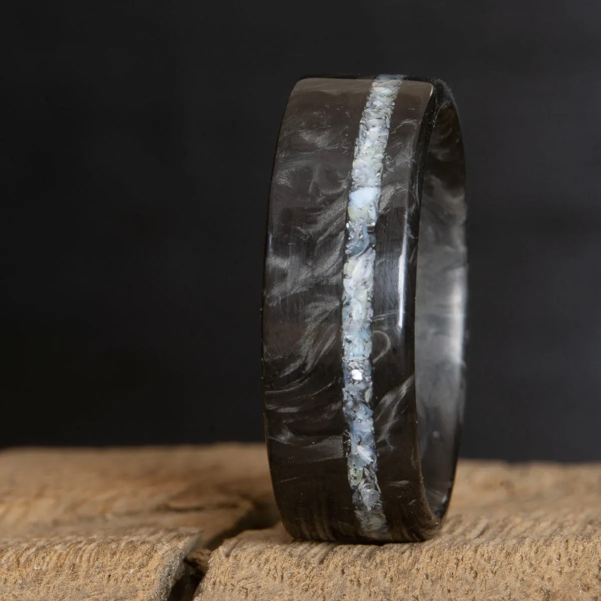 Forged carbon fiber ring with mother of pearl