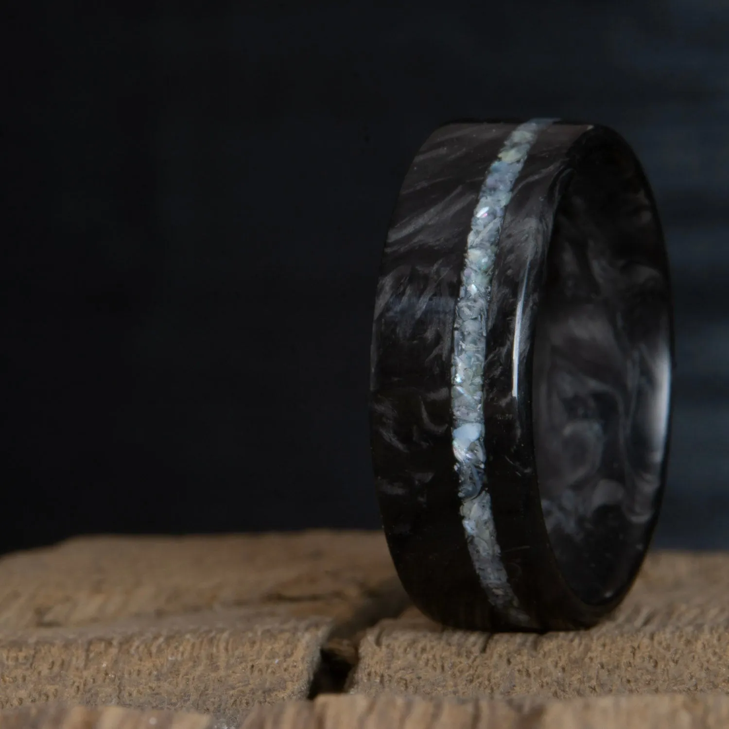 Forged carbon fiber ring with mother of pearl